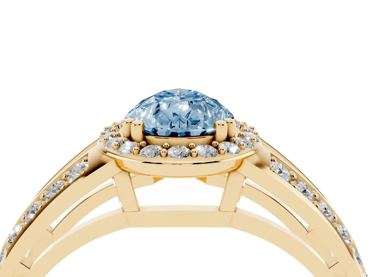 Fancy Blue Pear Cut Diamond Halo Ring with Split Shank Pavé Band and Four-Prong Setting Yellow gold