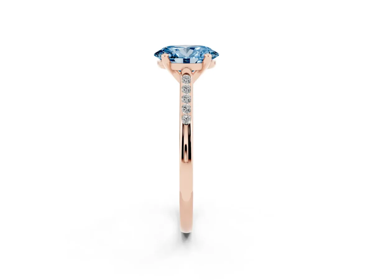 Fancy Blue Oval Cut Diamond Solitaire Ring with Channel Set Round Band and Prong Setting Rose gold