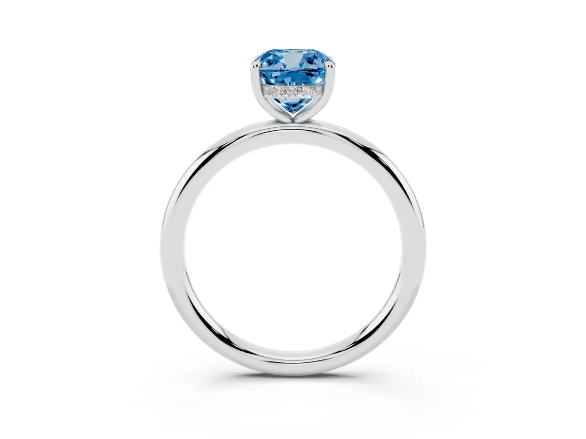 Fancy Blue Cushion Cut Diamond Solitaire Ring with Thin Band and Four-Prong Setting Platinum