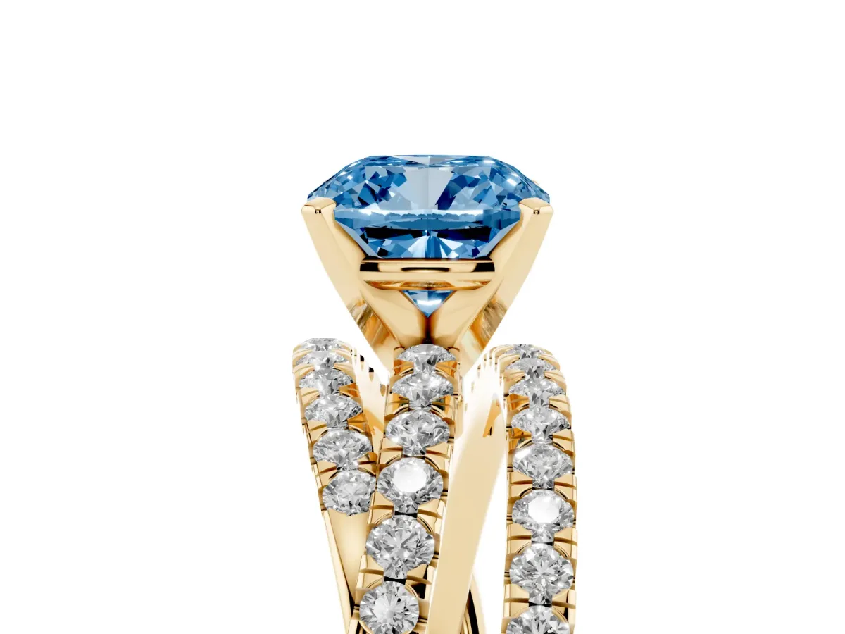 Fancy Blue Cushion Cut Solitaire Twist Band with Pavé Setting and Four-Prong Setting Yellow gold