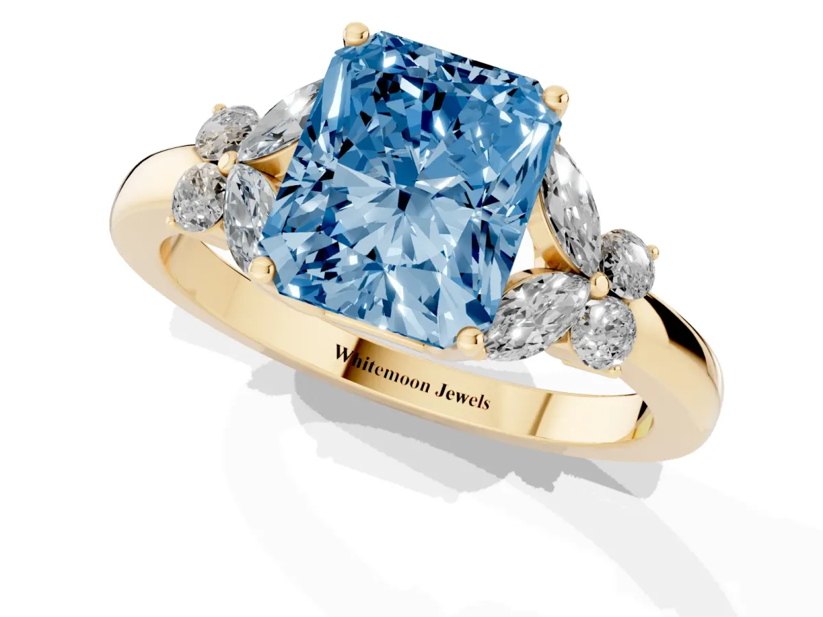 Fancy Blue Radiant Cut Cut Solitaire Floral Diamond Ring with Four-Prong Setting Yellow gold
