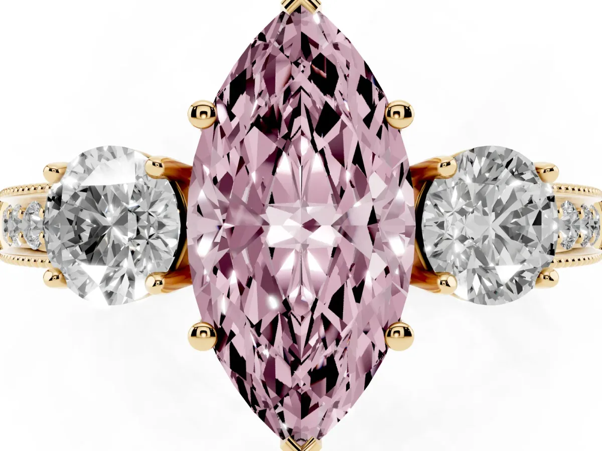 Fancy Pink Marquise Cut Three-Stone Diamond Ring with Pavé Band and Four-Prong Setting Yellow gold