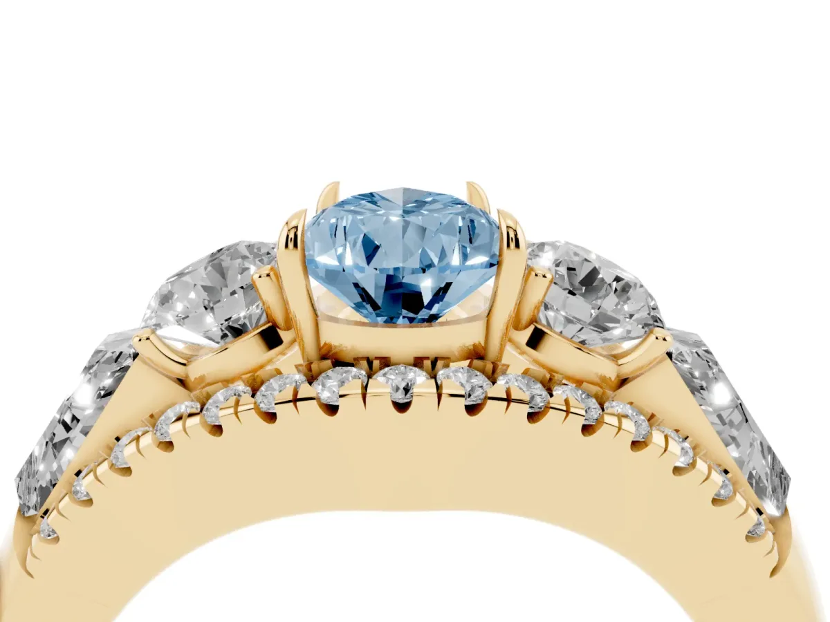 Fancy Blue Three-Stone Pear Cut Diamond Engagement Ring with Pave Band and Prong Setting Yellow gold