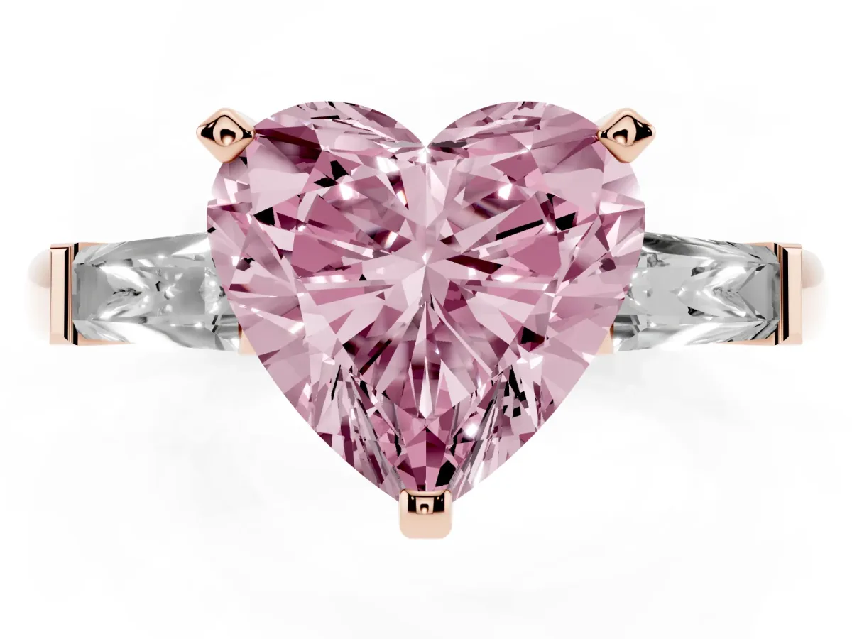 Fancy Pink Heart Cut Solitaire with Tapered Baguette Side Stones on a Classic Band with Four-Prong Setting Rose gold