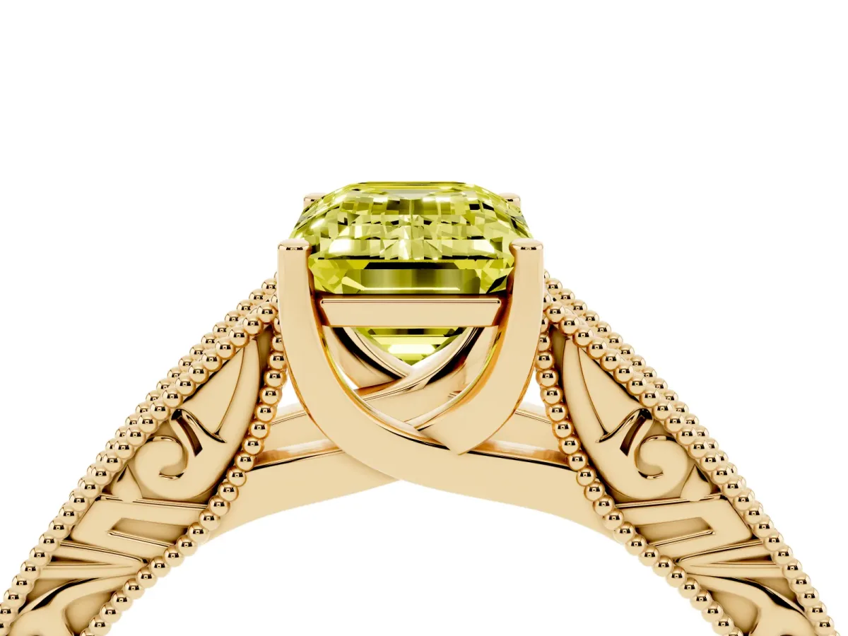 Fancy Yellow Emerald Cut Diamond Solitaire Ring with Engraved Band and Four-Prong Setting Yellow gold