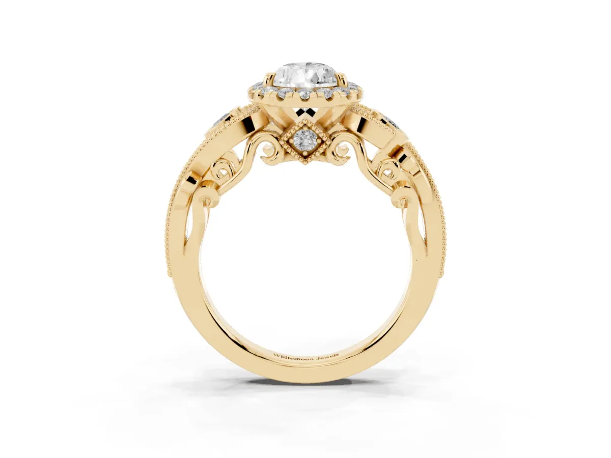 Pear Cut Halo Diamond Ring with Milgrain and Bezel Accents on a Split Shank Band Yellow gold