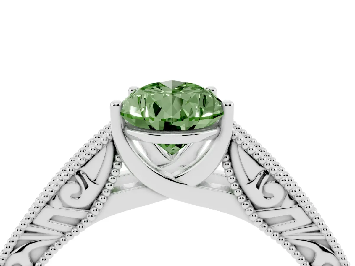 Fancy Green Pear Cut Diamond Solitaire Ring with Engraved Band and Four-Prong Setting Silver