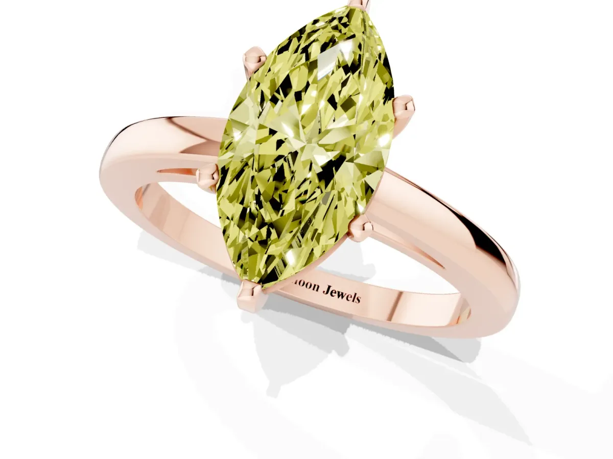 Fancy Yellow Marquise Cut Solitaire Diamond Engagement Ring with Four-Prong Setting on a Classic Band Rose gold