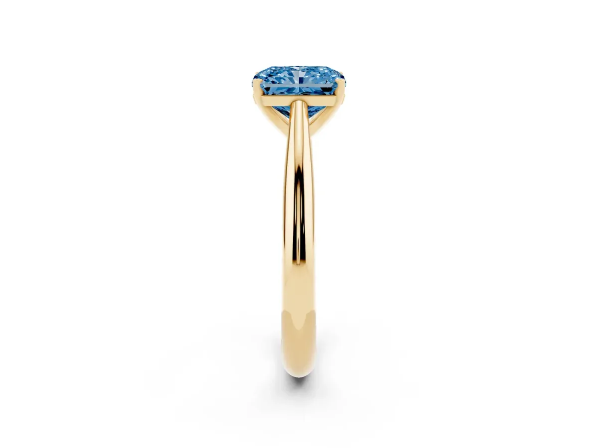 Fancy Blue Radiant Cut Diamond Solitaire Engagement Ring with Cathedral Setting and Four-Prong Mount Yellow gold