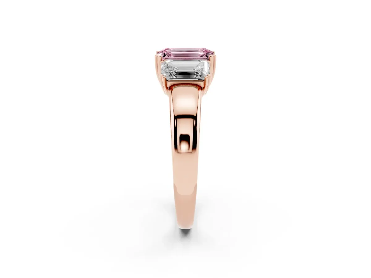 Fancy Pink Three-Stone Emerald Cut Cut Diamond Ring with Channel Set Band and Four-Prong Setting Rose gold