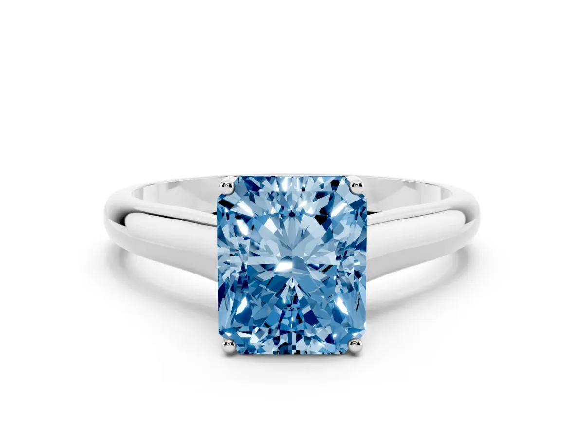 Fancy Blue Radiant Cut Solitaire Engagement Ring with Tapered Band and Four-Prong Setting Platinum
