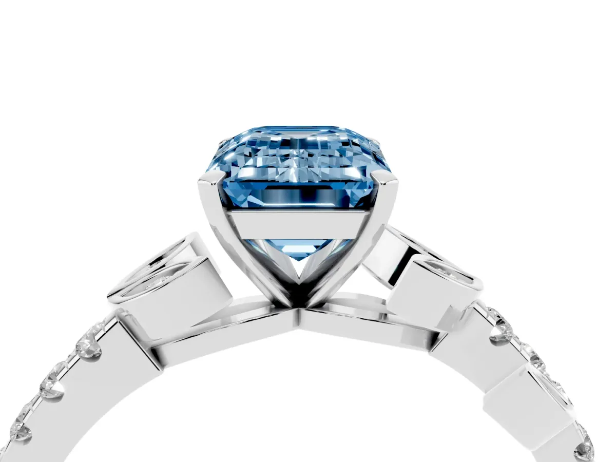 Fancy Blue Emerald Cut Solitaire Leaf-Inspired Diamond Ring with Pavé Band and Four-Prong Setting Silver