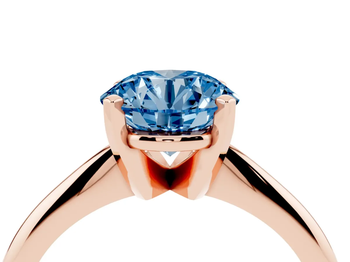 Fancy Blue Round Cut Cut Solitaire Ring with Four-Prong Setting on a Classic Band Rose gold