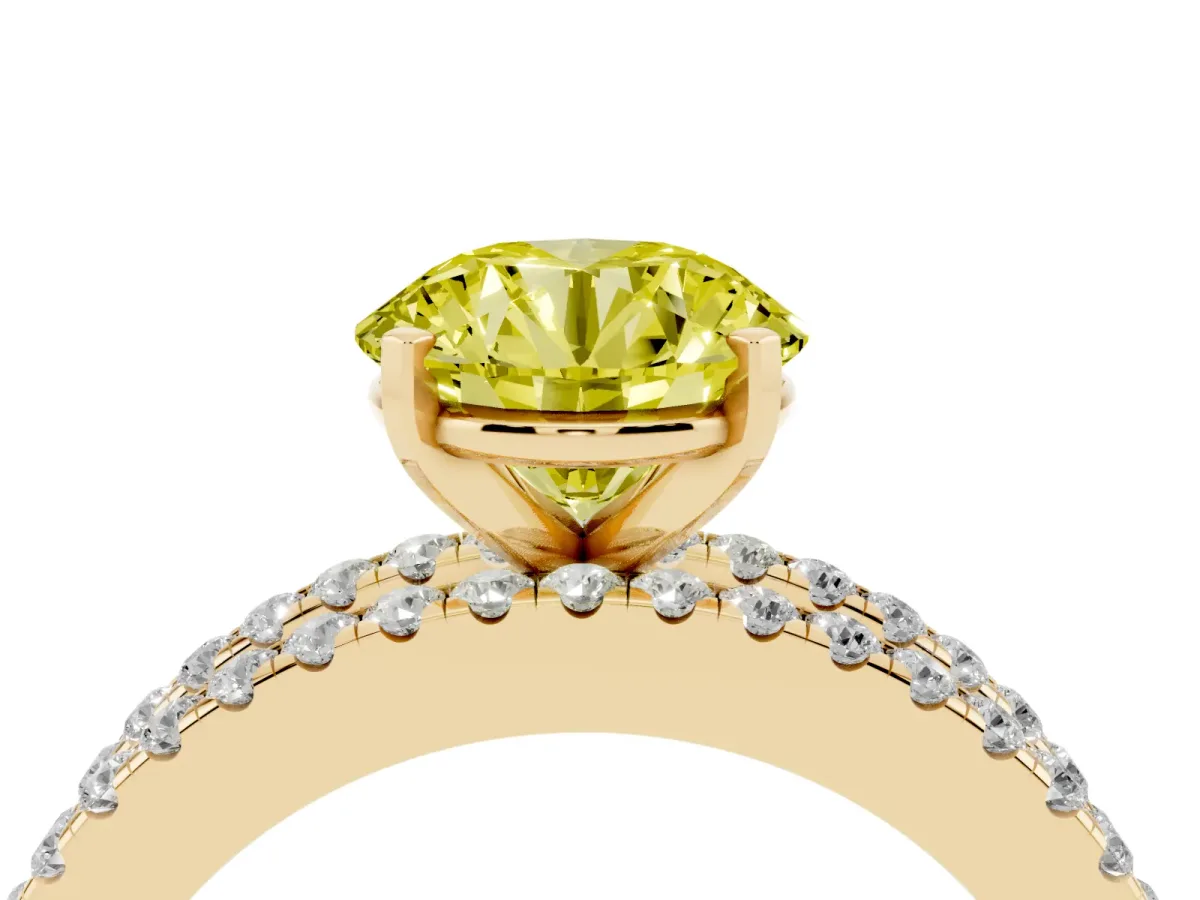 Fancy Yellow Round Cut Diamond Solitaire Ring with Pavé and Channel Set Band Yellow gold