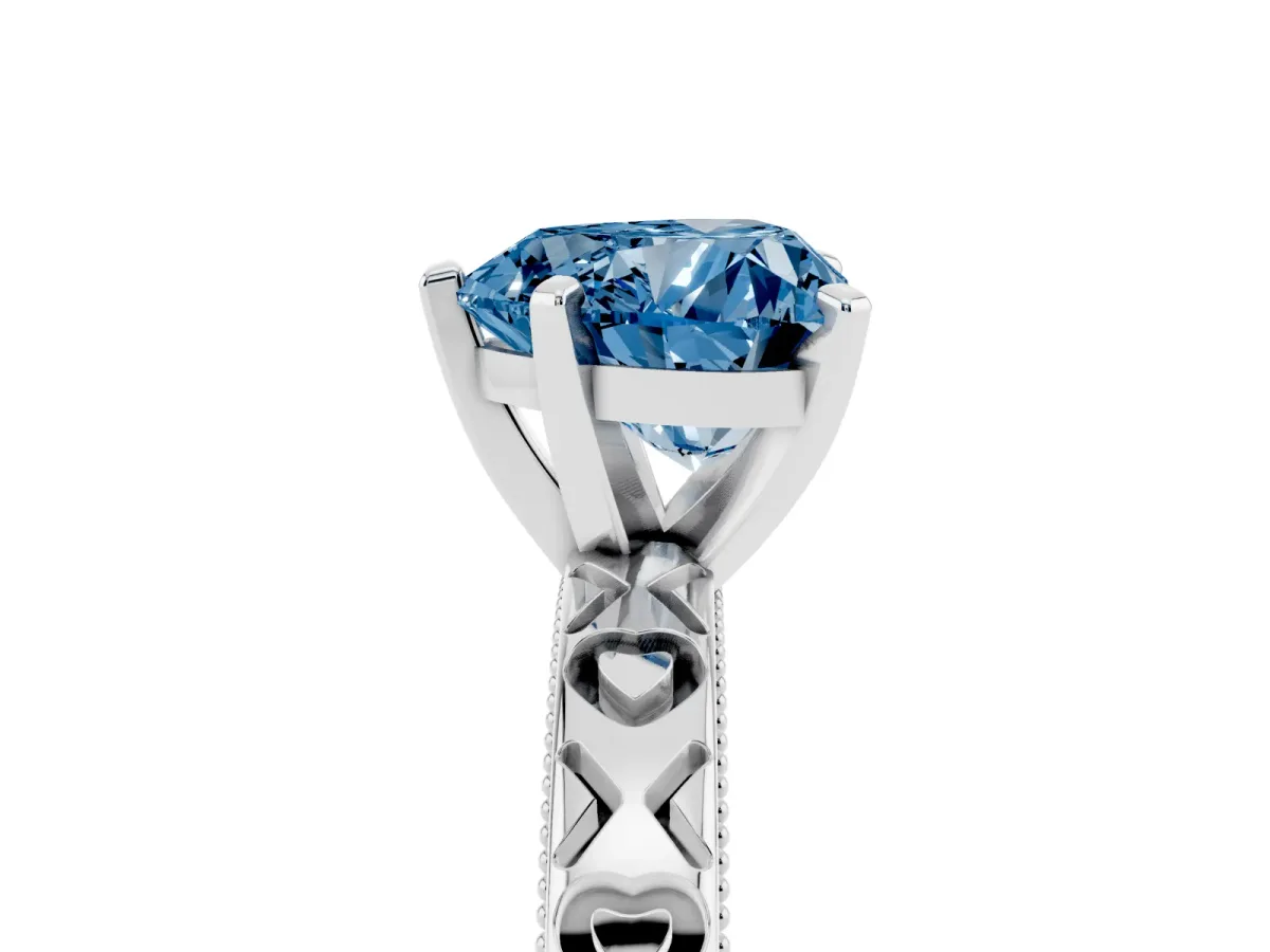 Fancy Blue Heart Cut Solitaire Diamond Engagement Ring with XO Engraved Band and Four-Prong Setting Silver