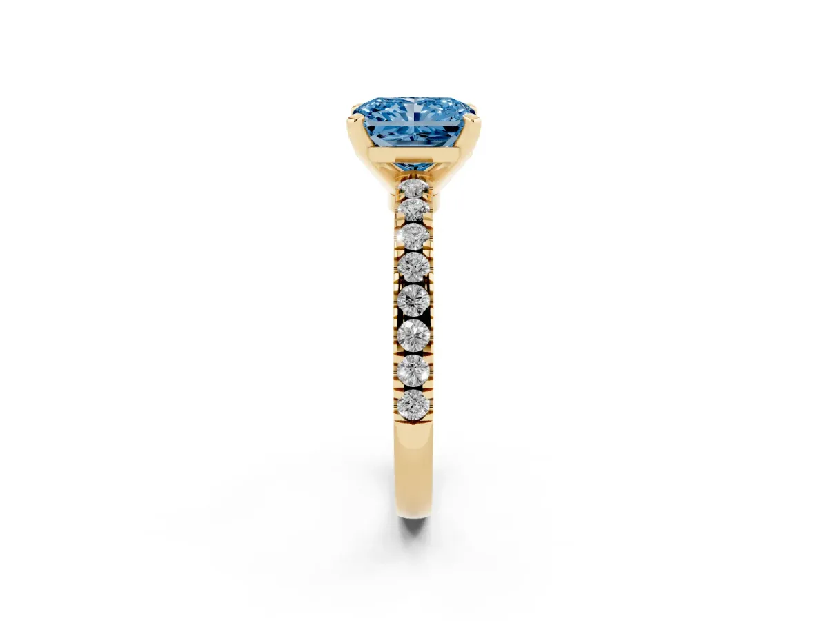Fancy Blue Radiant Cut Solitaire Diamond with Pavé Band and Four-Prong Setting Yellow gold