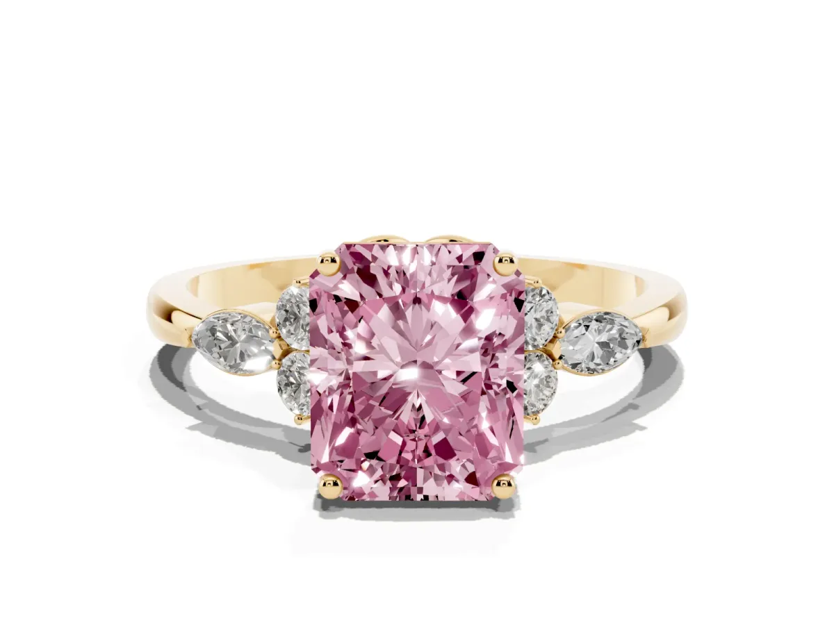 Fancy Pink Radiant Cut Brilliant Diamond Solitaire Ring with Pear Side Stones and Four-Prong Setting Yellow gold