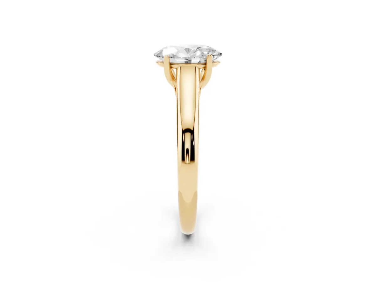 Oval Cut Solitaire Engagement Ring with Tapered Band and Four-Prong Setting Yellow gold