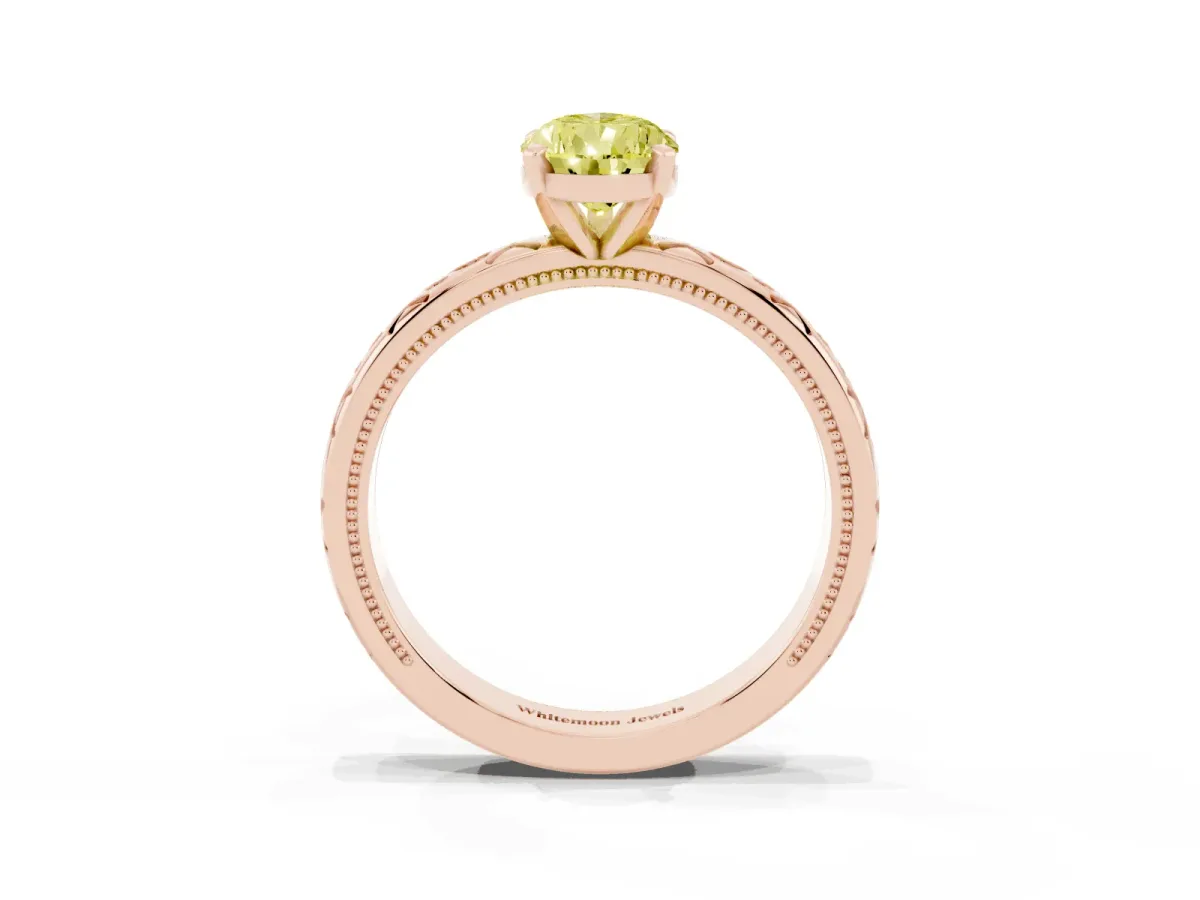 Fancy Yellow Pear Cut Solitaire Engagement Ring with Scrollwork Band and Four-Prong Setting Rose gold