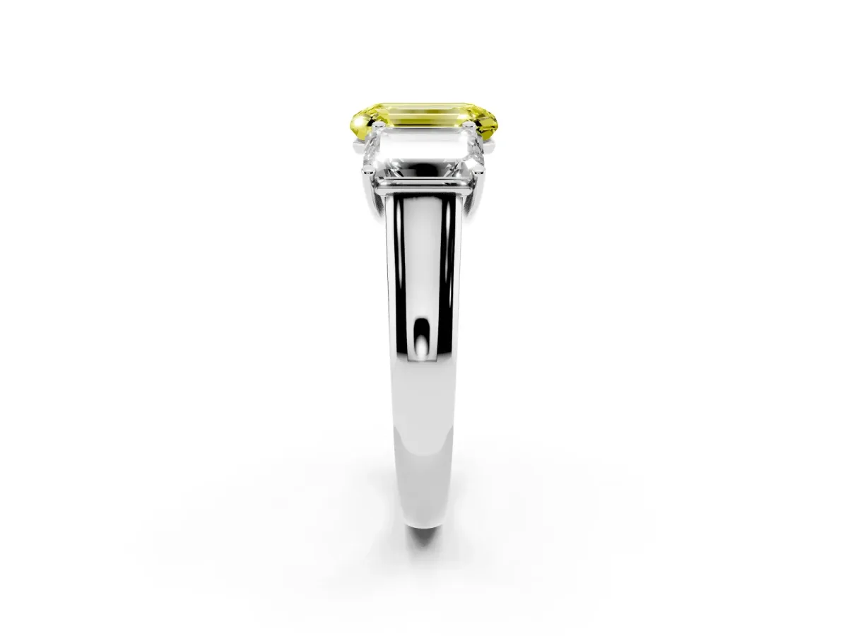 Fancy Yellow Emerald Cut Three-Stone Diamond Ring with Prong Setting on a Classic Band Silver
