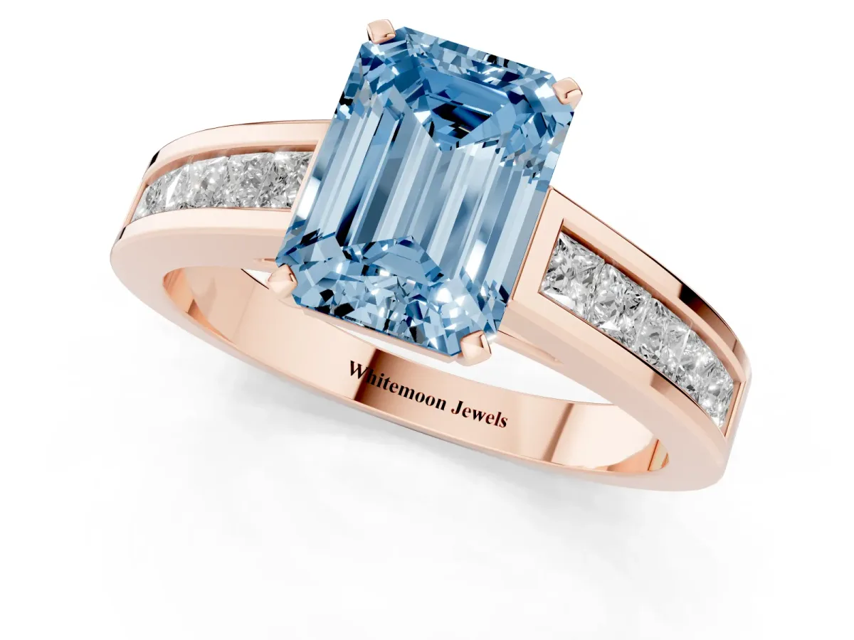 Fancy Blue Emerald Cut Solitaire Diamond Ring with Channel-Set Band and Four-Prong Setting Rose gold