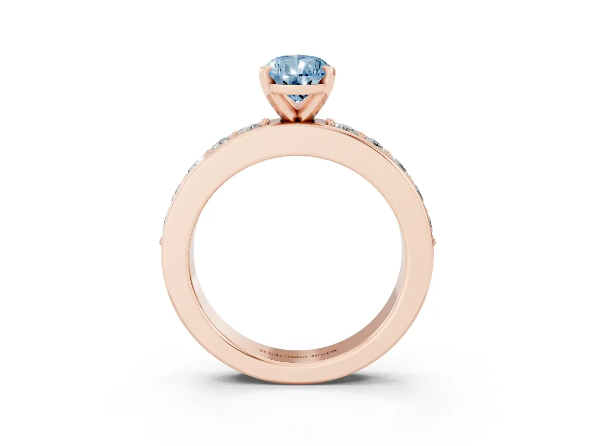 Fancy Blue Pear Cut Diamond Engagement Ring with Channel Set Round Band and Prong Setting Rose gold