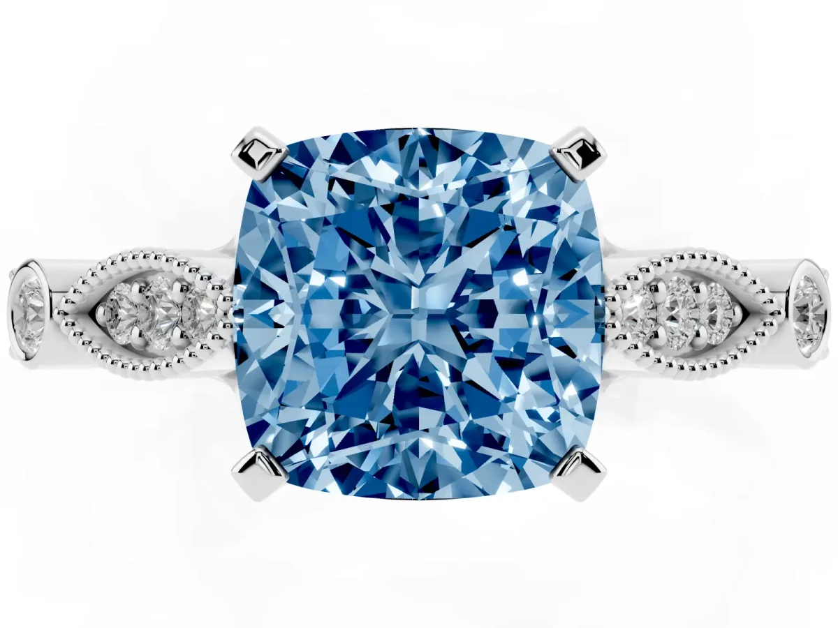 Fancy Blue Cushion Cut Cut Diamond with Milgrain Marquise and Bezel Accents on a Solitaire Band with Prong Setting White gold