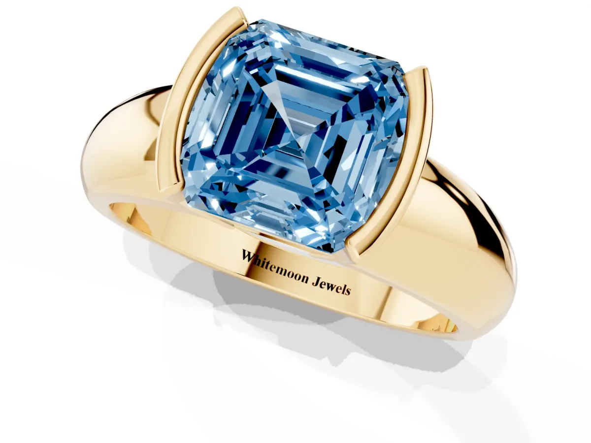 Fancy Blue Asscher Cut Solitaire Tension Set Diamond Ring with Wide Band Yellow gold