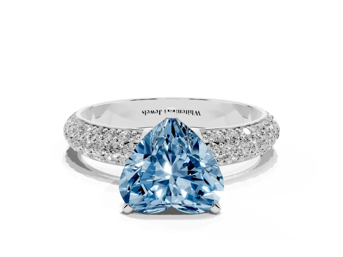Fancy Blue Heart Cut Diamond Solitaire Ring with Prong Setting and Pavé Band Silver