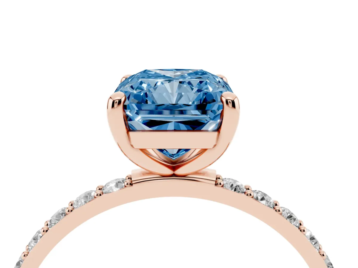 Fancy Blue Radiant Cut Diamond Solitaire Ring with Round Pavé Band and Prong Setting Rose gold