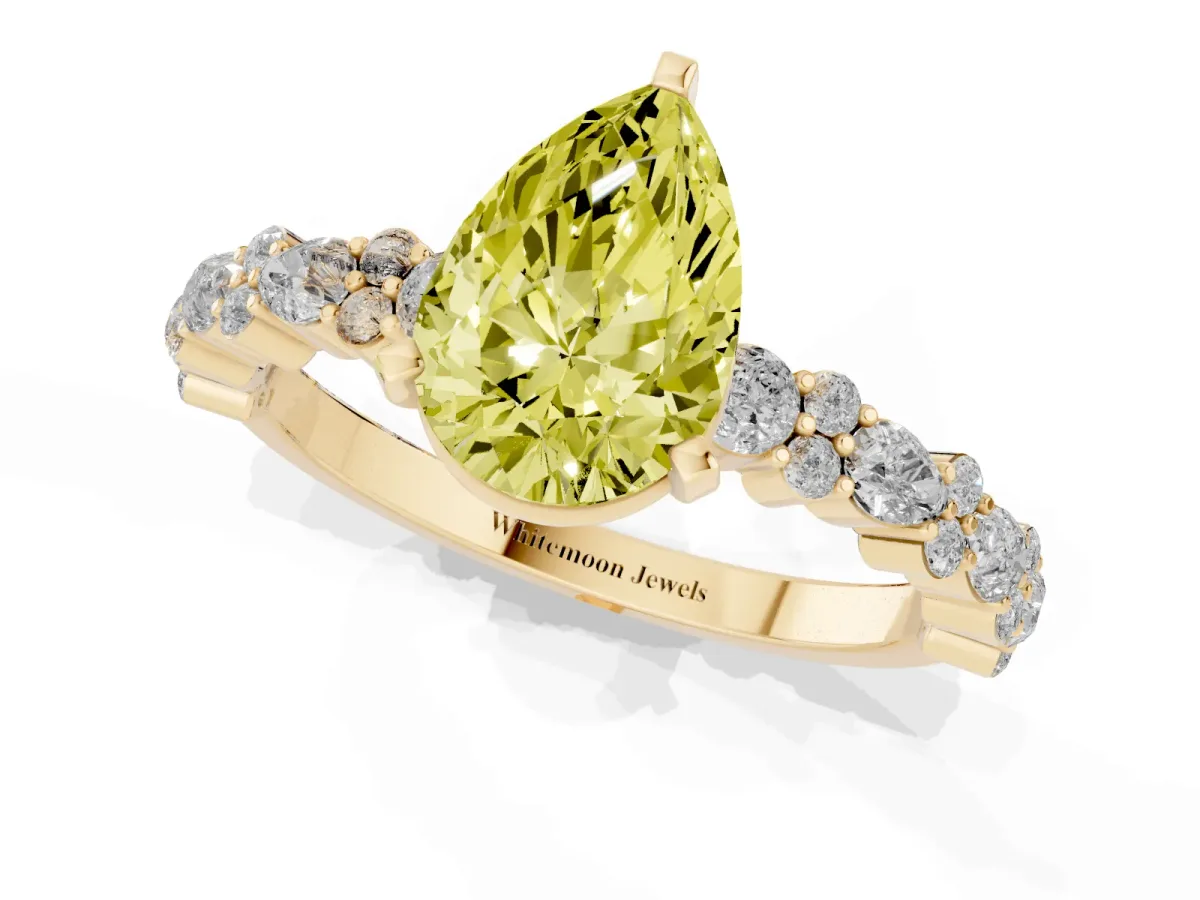Fancy Yellow Pear Cut Diamond Side Stone Solitaire Ring with Round and Four-Prong Setting Yellow gold