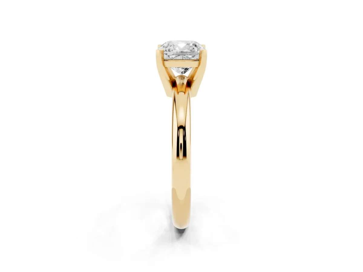 Cushion Cut Diamond Solitaire Engagement Ring with Round Band and Four-Prong Setting Yellow gold