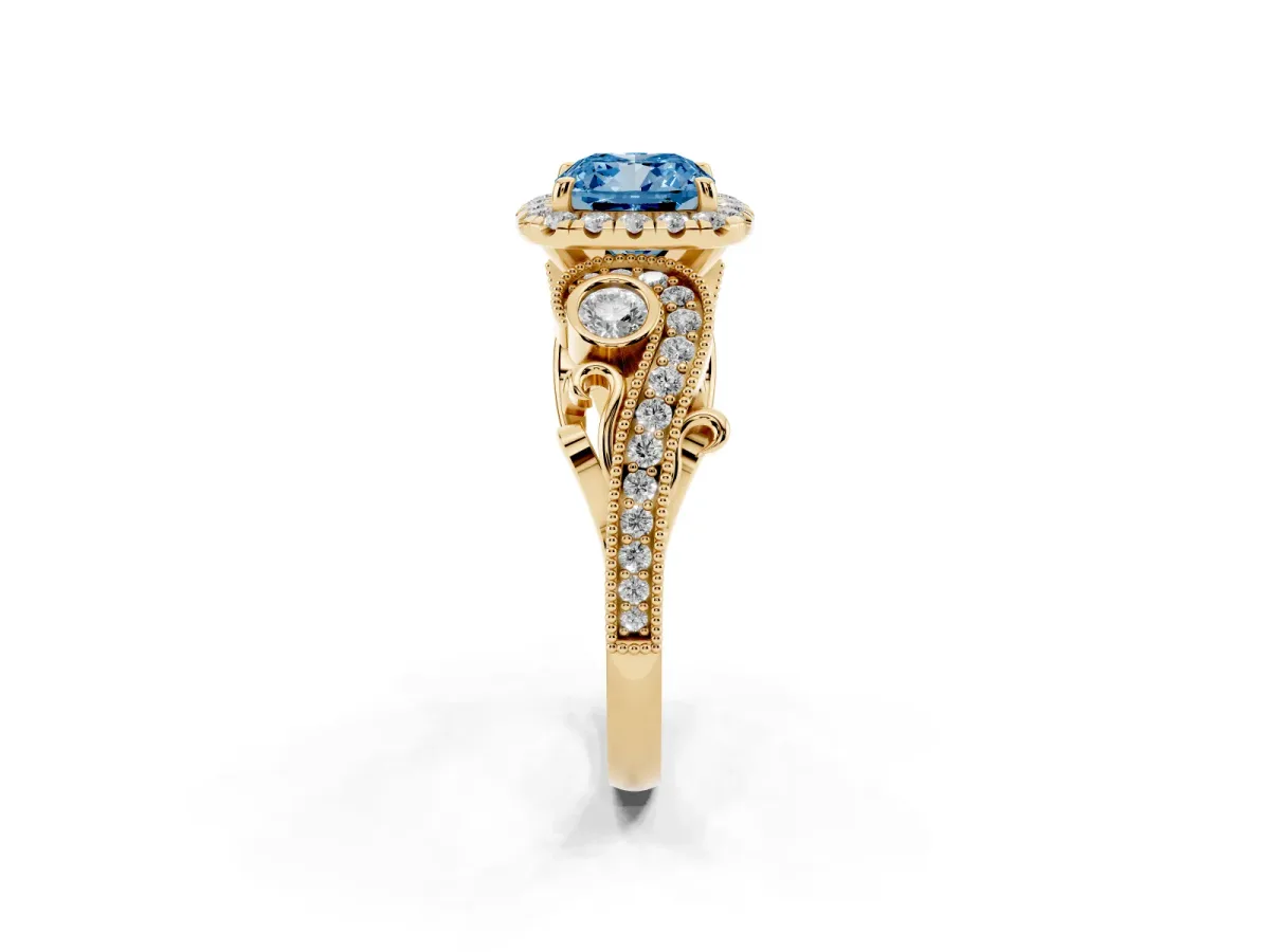 Fancy Blue Cushion Cut Halo Diamond Ring with Milgrain and Bezel Accents on a Split Shank Band Yellow gold