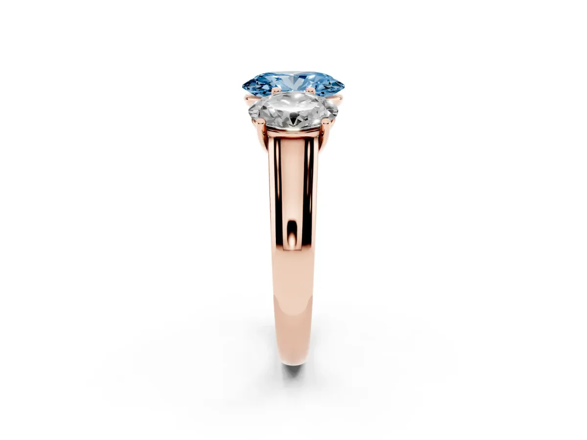 Fancy Blue Oval Cut Three-Stone Diamond Ring with Prong Setting on a Classic Band Rose gold