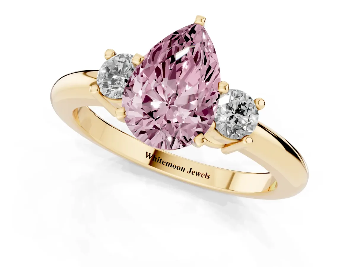 Fancy Pink Three-Stone Pear Cut Cut Diamond Solitaire with Prong Setting and Classic Band Yellow gold