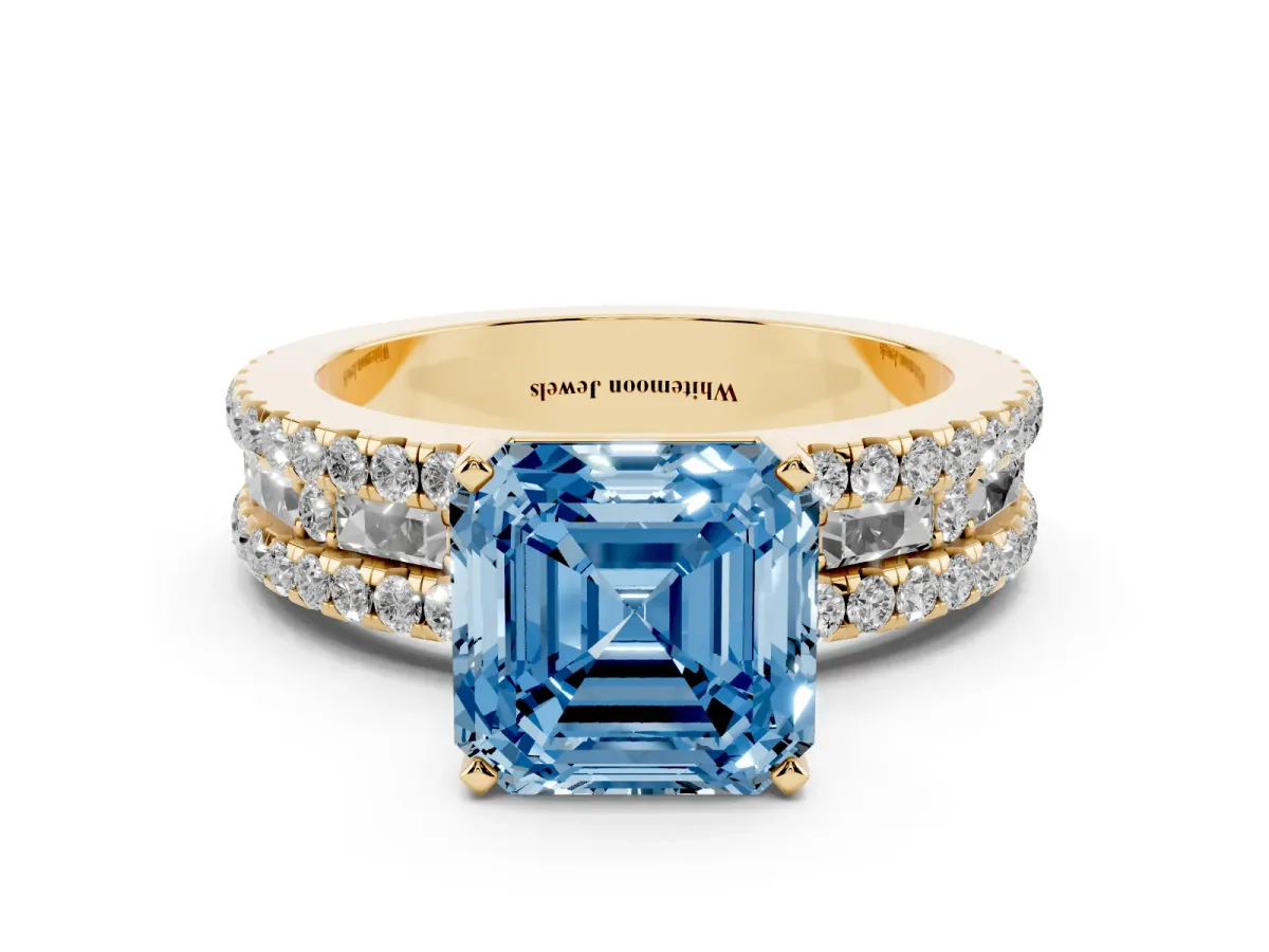 Fancy Blue Asscher Cut Diamond Solitaire Ring with Pavé and Channel Set Band Yellow gold