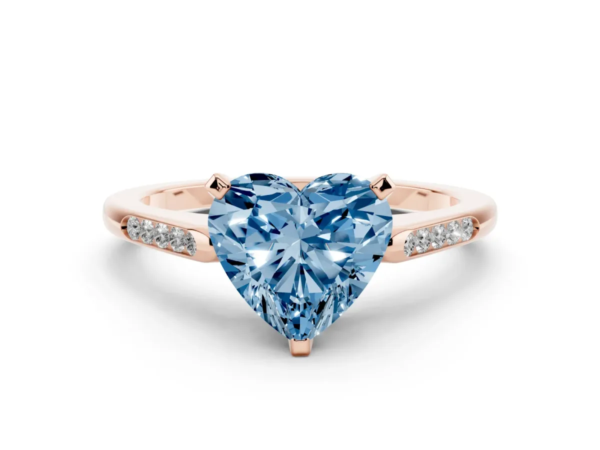 Fancy Blue Heart Cut Diamond Solitaire Ring with Channel Set Round Band and Prong Setting Rose gold