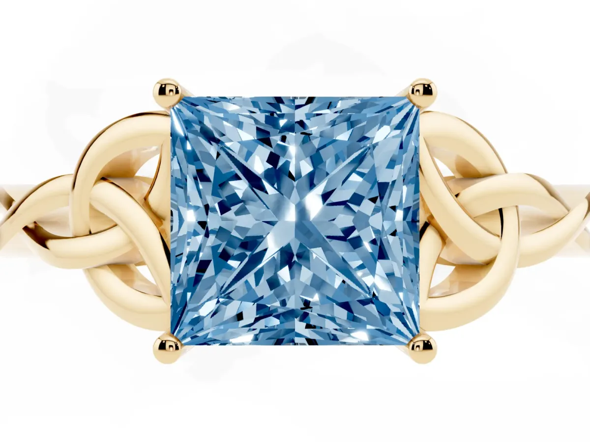 Fancy Blue Princess Cut Diamond Solitaire Engagement Ring with Celtic Knot Band and Four-Prong Setting Yellow gold