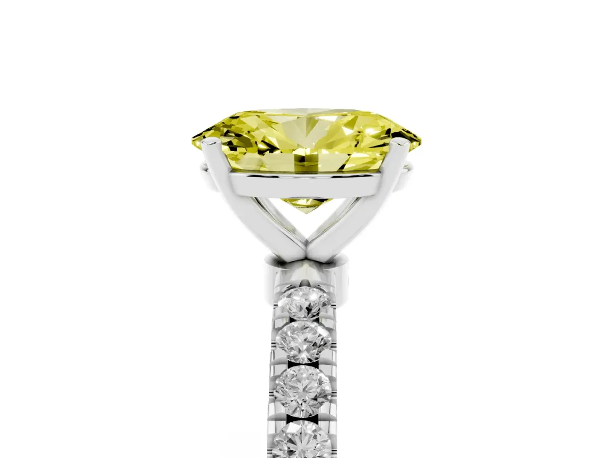 Fancy Yellow Oval Cut Diamond Solitaire Ring with Pavé Accents and Four-Prong Setting White gold