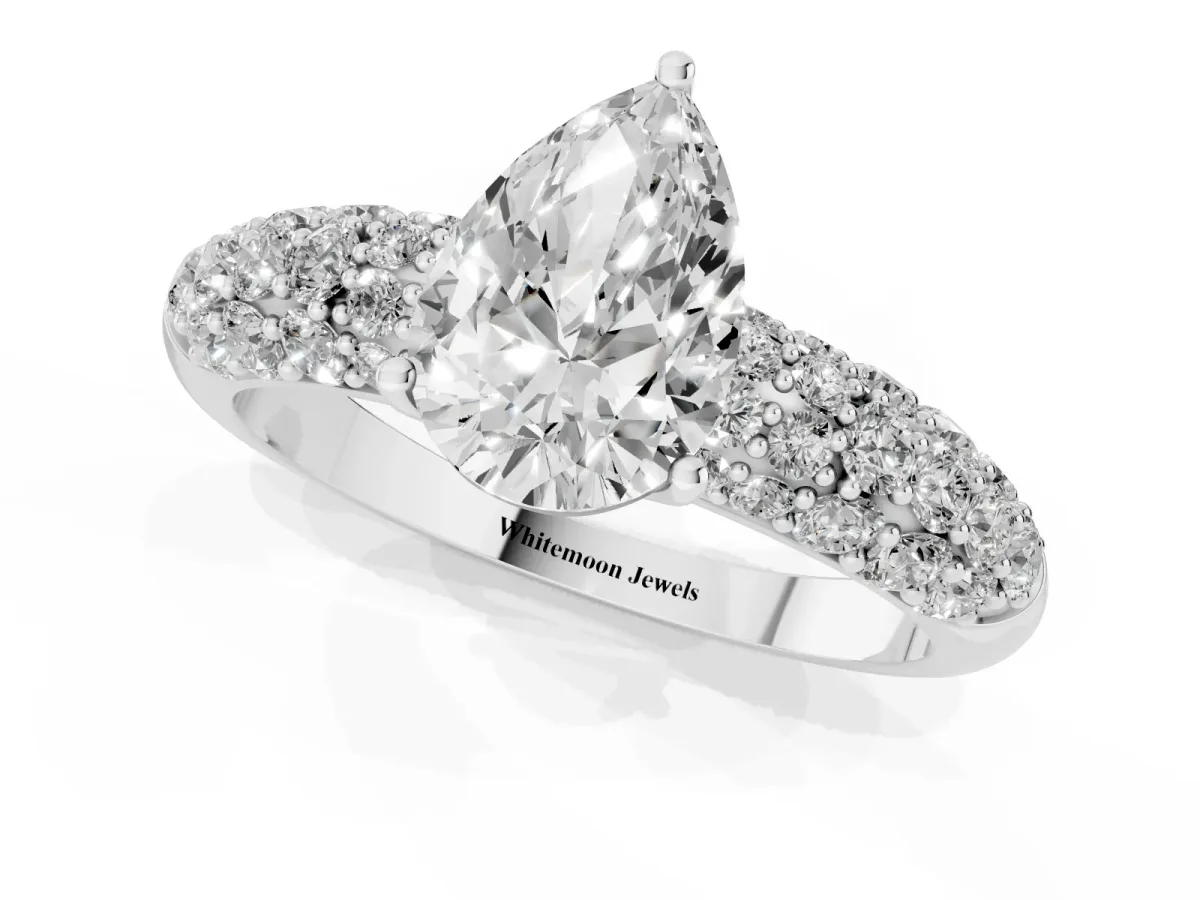 Pear Cut Diamond Pavé Band Solitaire Ring with Four-Prong Setting Silver