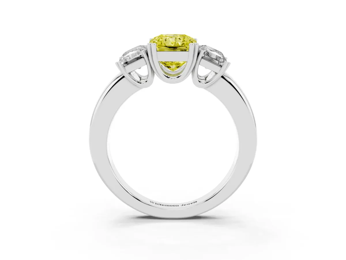 Fancy Yellow Three-Stone Radiant Cut Cut Diamond Ring with Channel Set Band and Four-Prong Setting Platinum