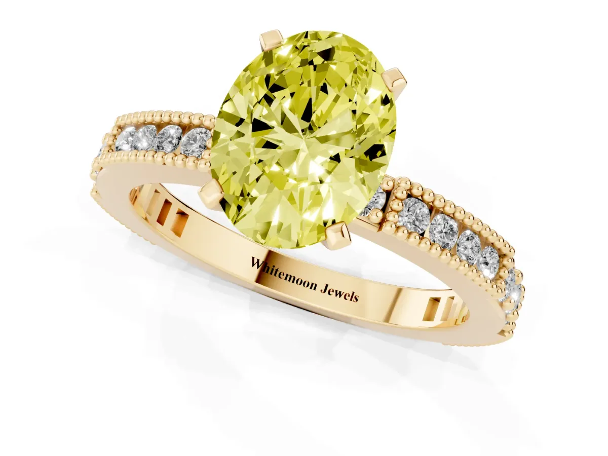 Fancy Yellow Oval Cut Solitaire with Pavé Band and Four-Prong Setting Yellow gold