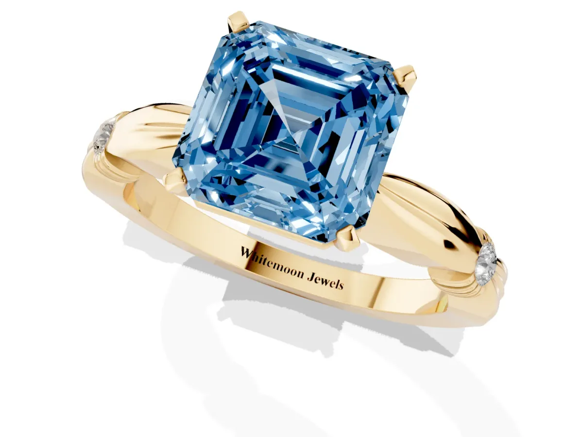 Fancy Blue Asscher Cut Solitaire Diamond Twisted Band with Four-Prong Setting Yellow gold