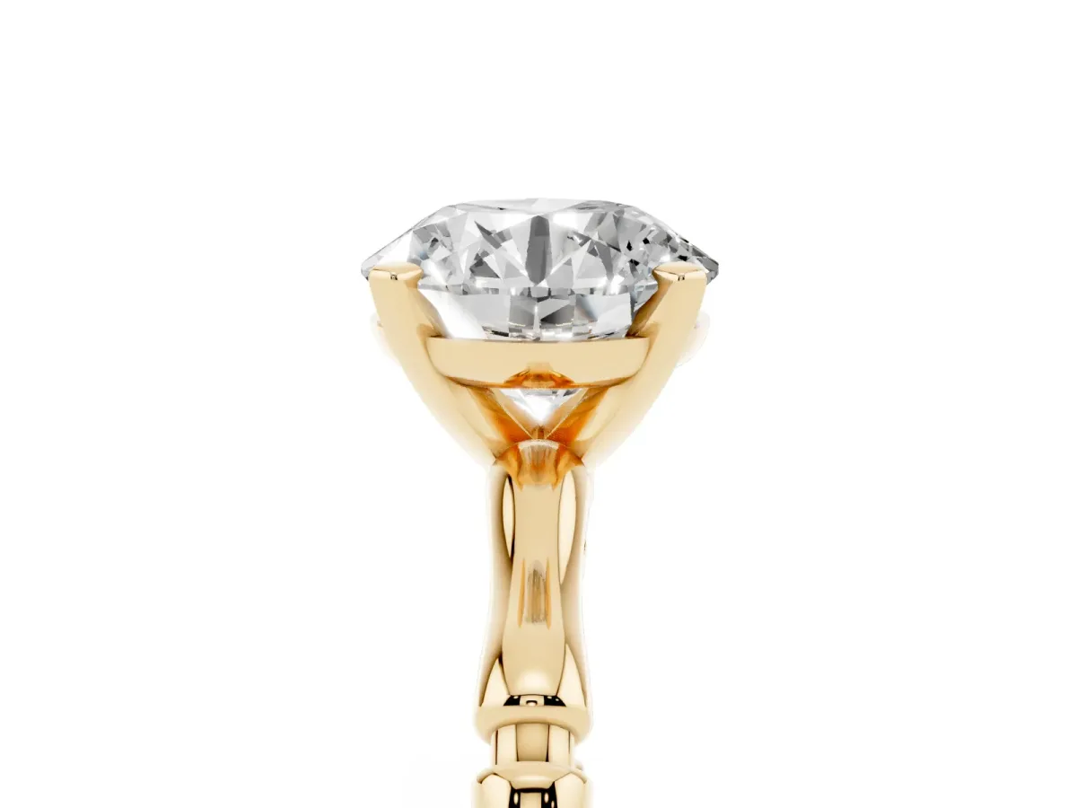 Round Cut Solitaire Diamond Ring with Bamboo Band and Four-Prong Setting Yellow gold