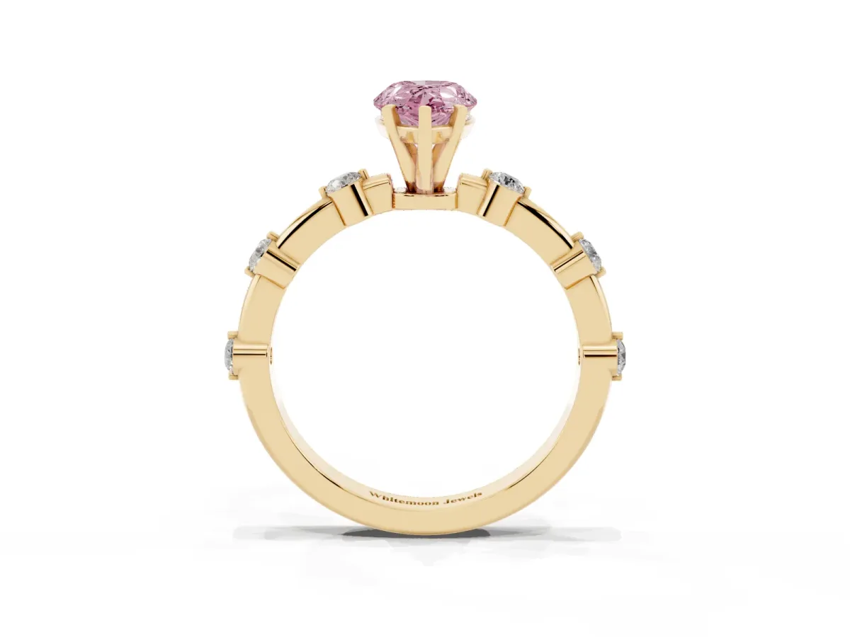 Fancy Pink Pear Cut Solitaire Diamond Ring with Bezel Set Side Stones and Prong Setting Yellow gold