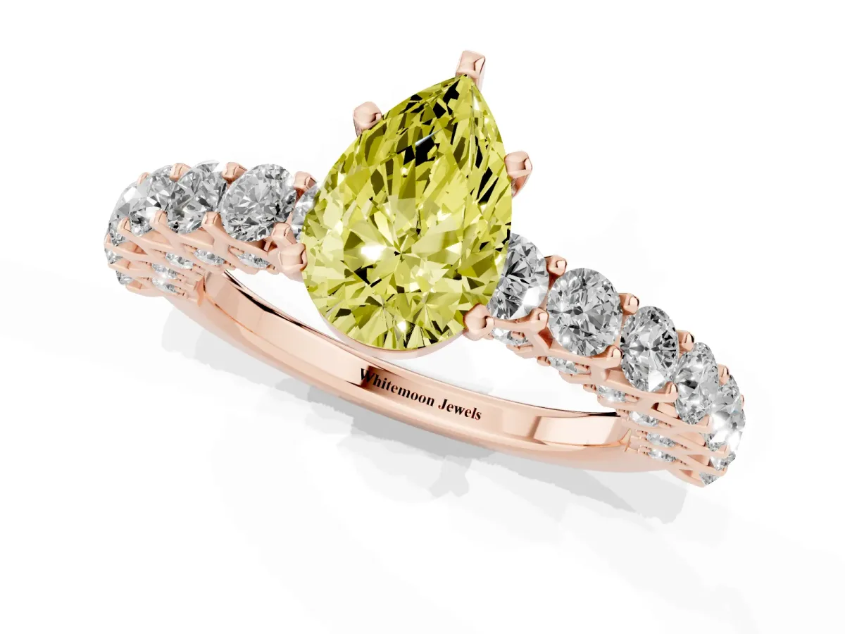 Fancy Yellow Pear Cut Diamond Solitaire Ring with Shared Prong Pavé Band and Four-Prong Setting Rose gold