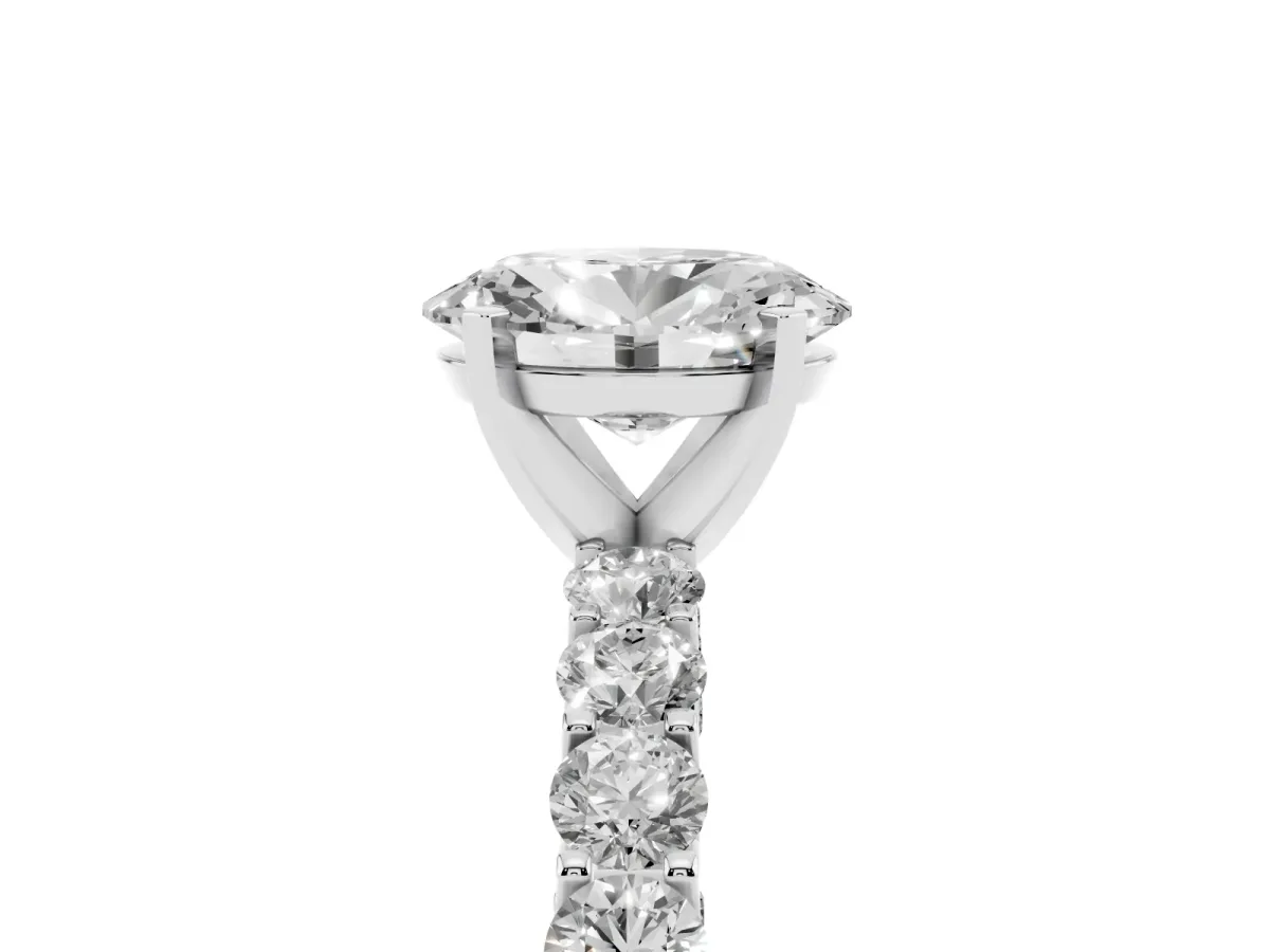 Oval Cut Diamond Solitaire Ring with Shared Prong Pavé Band and Four-Prong Setting Silver