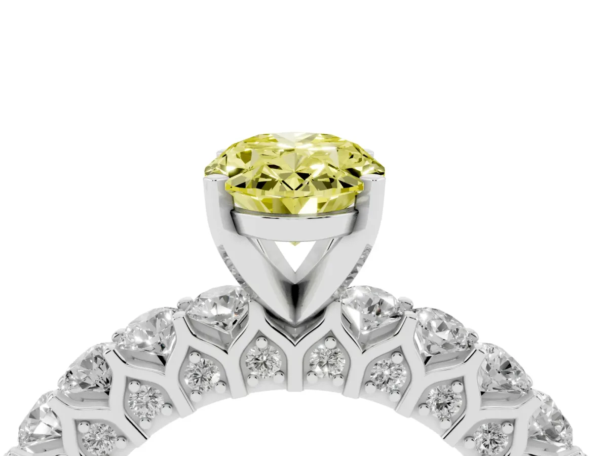 Fancy Yellow Oval Cut Diamond Solitaire Ring with Shared Prong Pavé Band and Four-Prong Setting Silver
