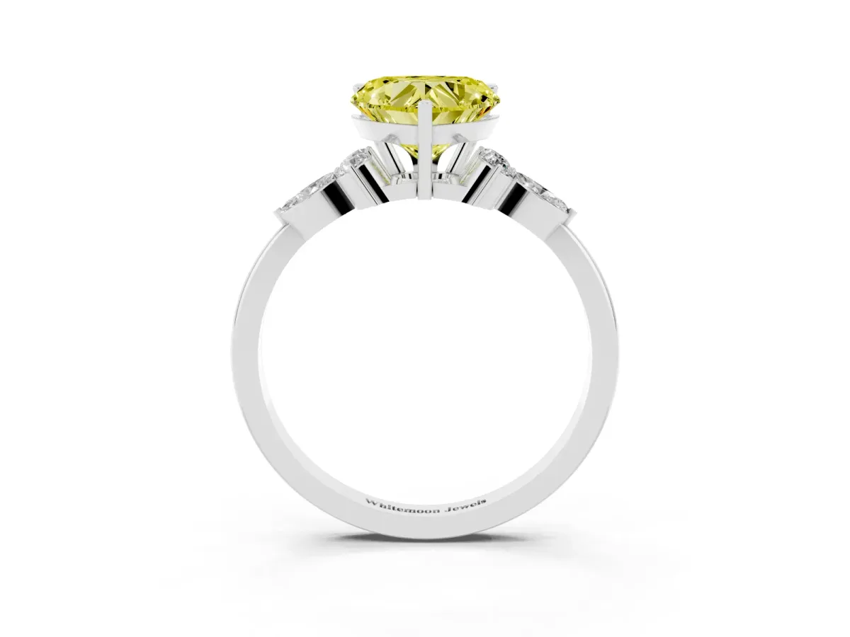 Fancy Yellow Heart Cut Brilliant Diamond Solitaire Ring with Pear Side Stones and Four-Prong Setting Silver