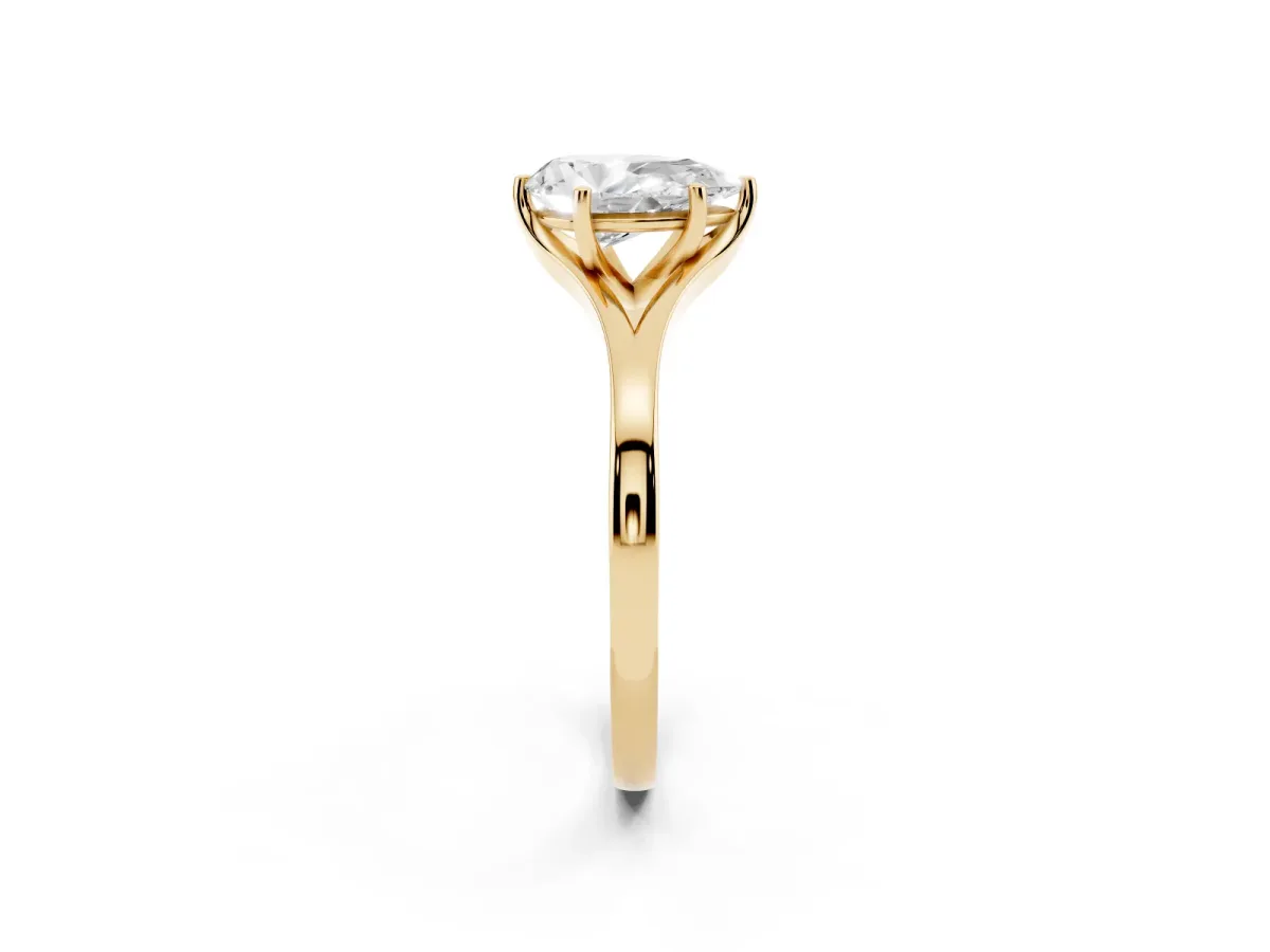 Pear Cut Solitaire Diamond Ring with Six-Prong Setting and Tapered Band Yellow gold